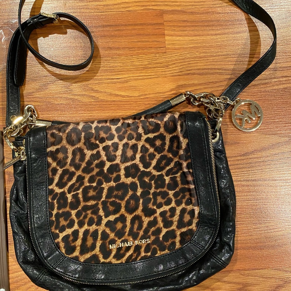 Michael Kors crossbody bag with so much space and flap over panel extra storage